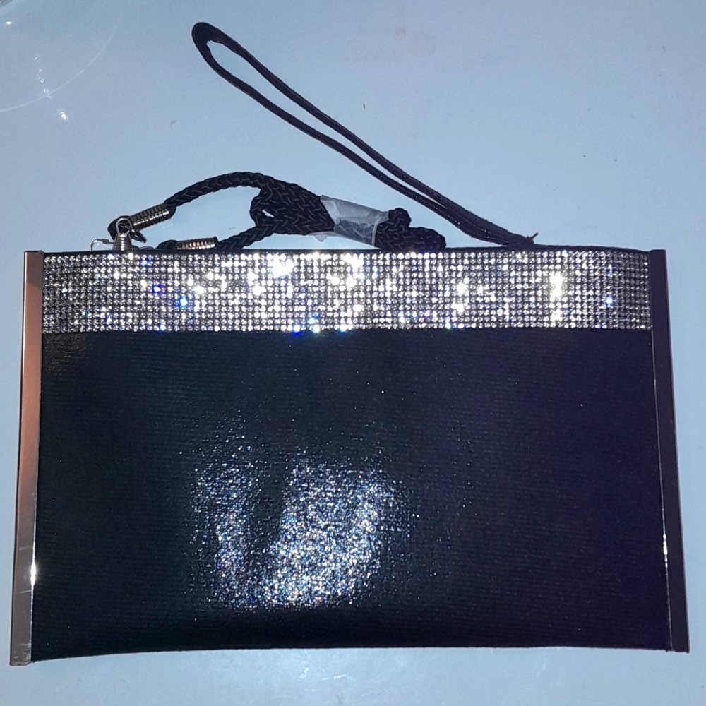 Nina Shoe's Black Clutch